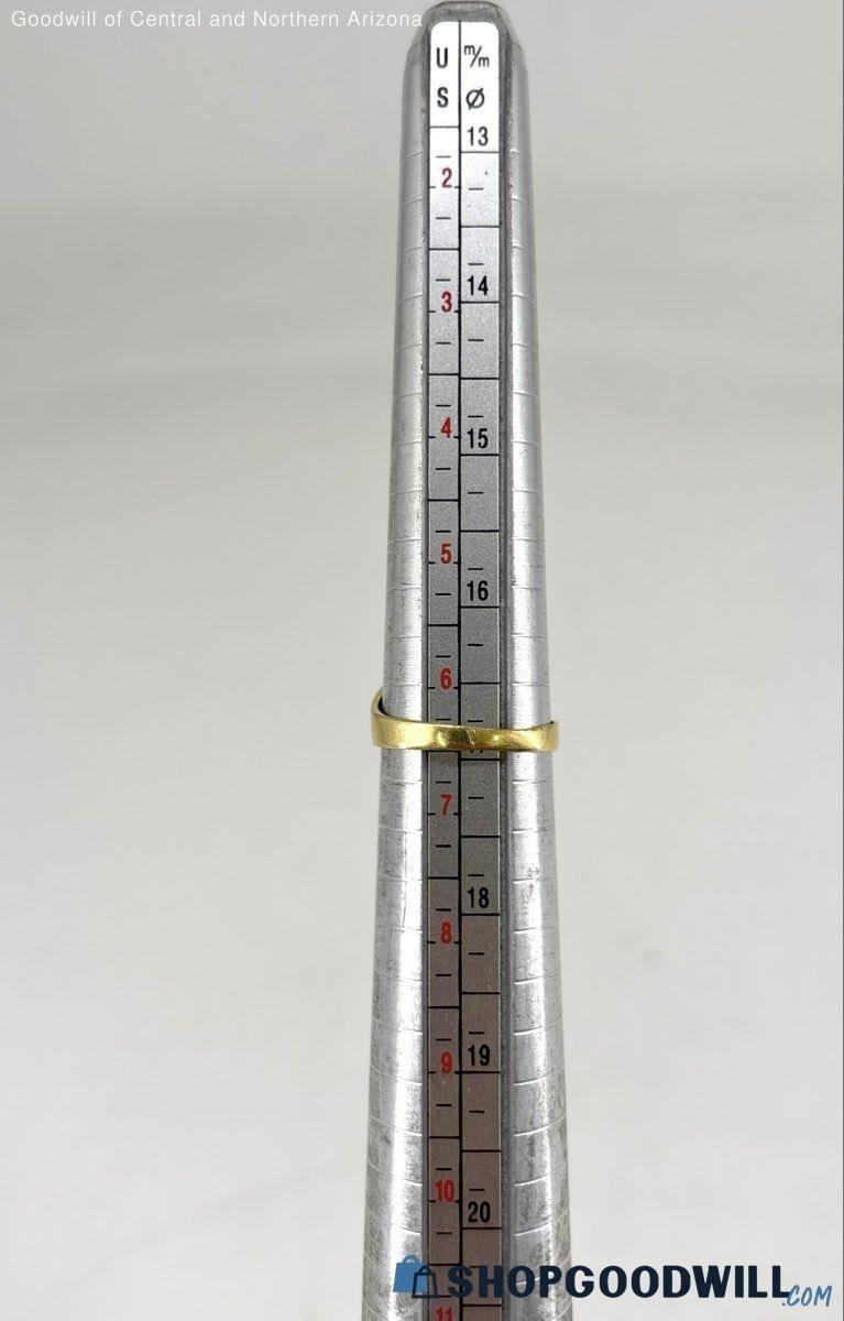 The Orbit ring shown on sizing mandrel at approximately US 6.5