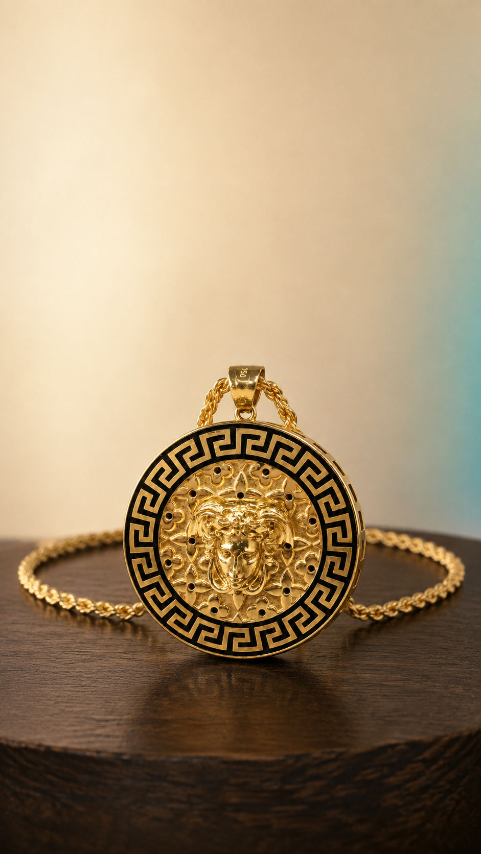 The Aegis vintage 18K gold Medusa necklace on dark wood