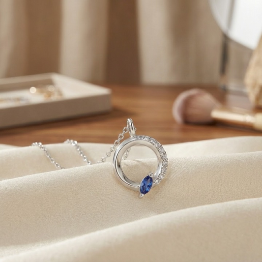 Sterling Silver Circle Necklace with Blue Marquise Stone – Modern, Minimal & Elegant